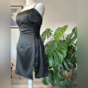 🛍️Large black mini dress with adjust both side of dress with string excellent.
